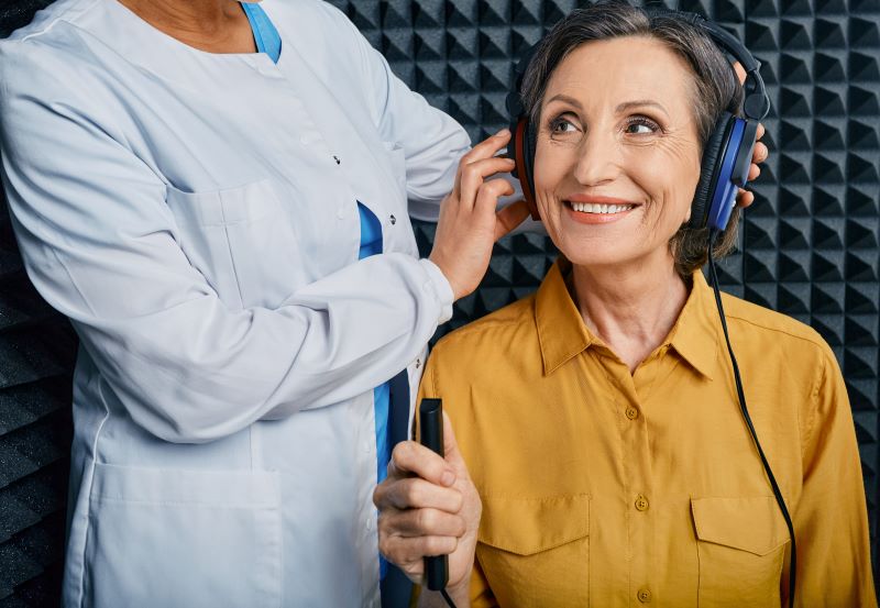 Beltone patient receives her annual hearing test